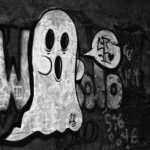 a black and white photo of a ghost on a wall — Foto por Kyle Larivee na Unsplash
