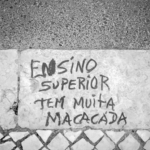 a cement wall with graffiti written on it — Foto por Manuel Palmeira na Unsplash