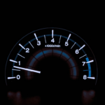 white and blue analog tachometer gauge — Foto por Chris Liverani na Unsplash